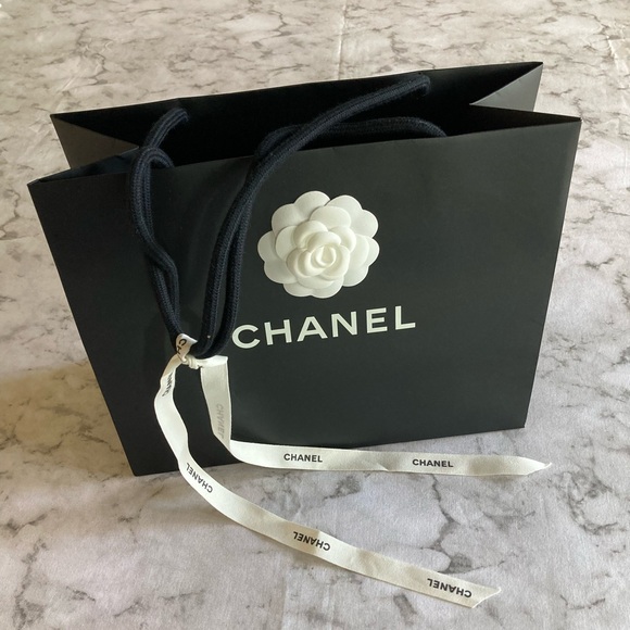 CHANEL Handbags - Chanel Black Shopping bag with 1 White Camellia Flower and ribbon!